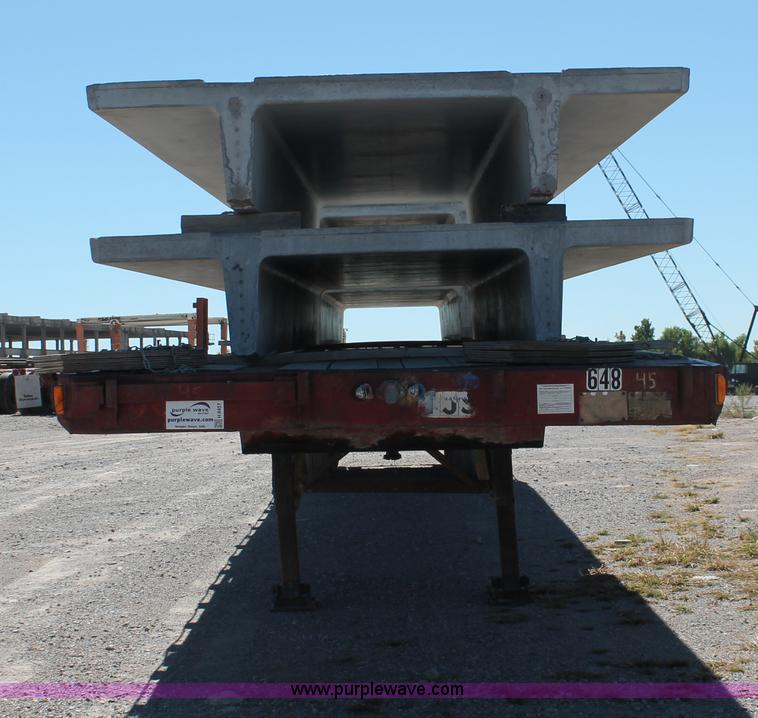 image for item H8457 1989 Fruehauf flatbed tandem axle float trailer