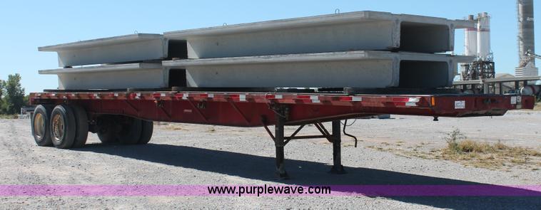 image for item H8458 1989 Fruehauf flatbed tandem axle float trailer