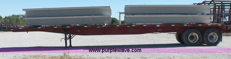 image for item H8458 1989 Fruehauf flatbed tandem axle float trailer