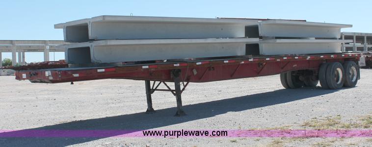 image for item H8458 1989 Fruehauf flatbed tandem axle float trailer