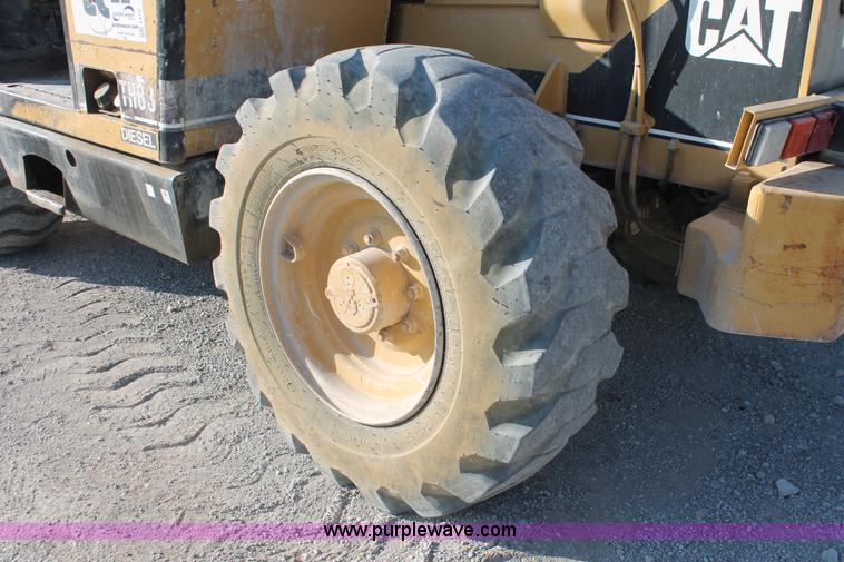 image for item I4737 1999 Caterpillar TH83 telehandler