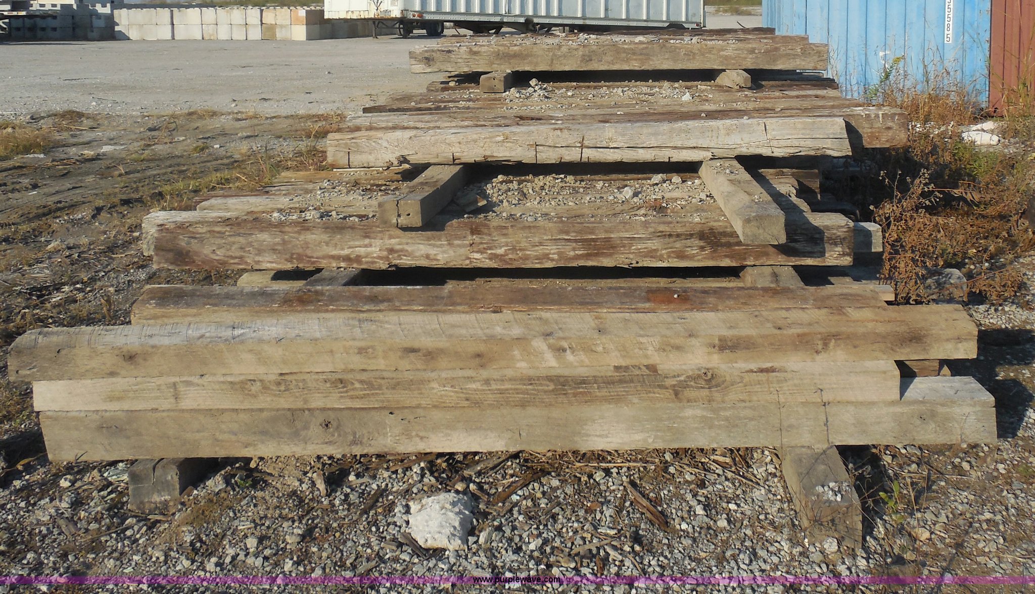 (100) wood railroad ties in Broken Arrow, OK Item I4730 sold Purple Wave