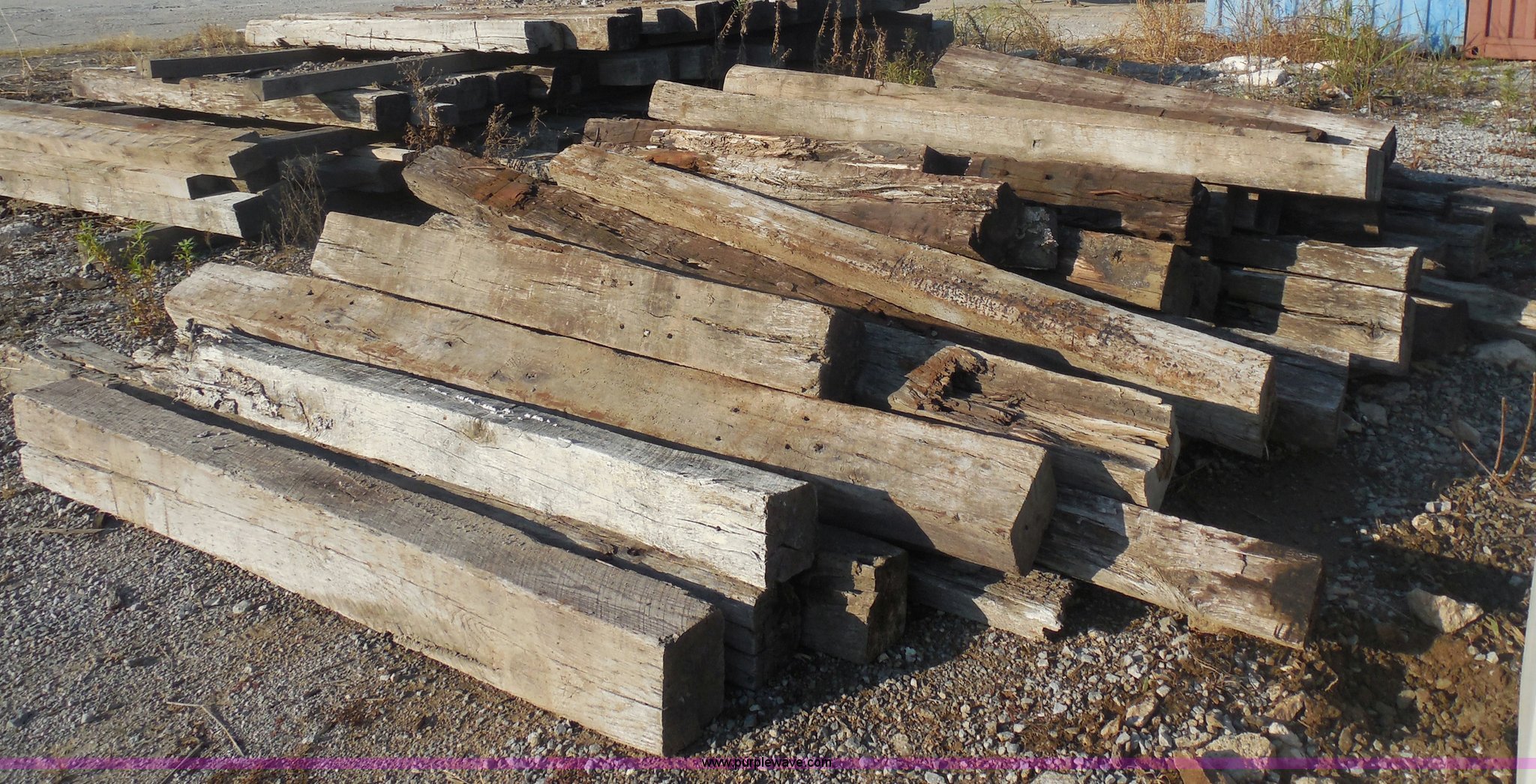 (100) wood railroad ties in Broken Arrow, OK Item I4730 sold Purple Wave