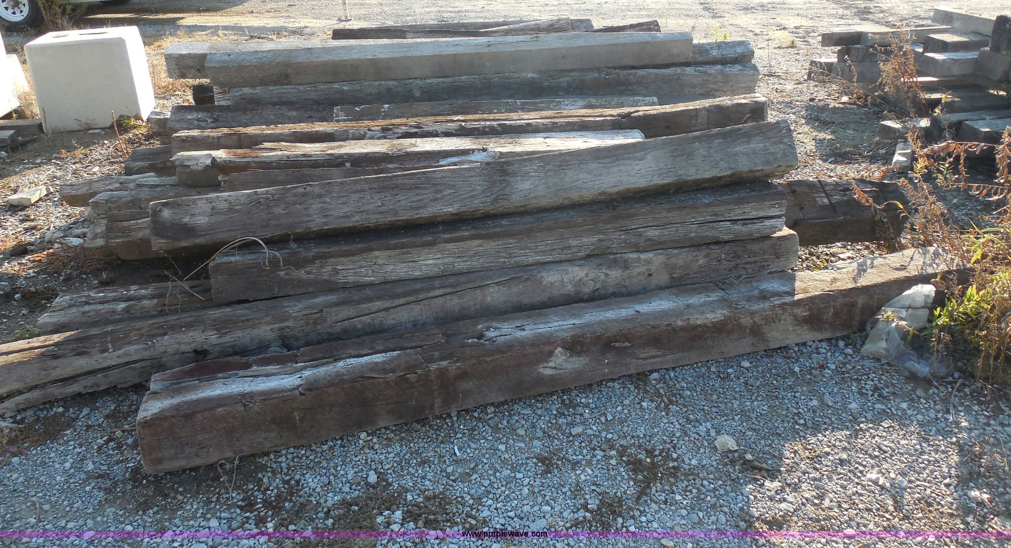 (100) wood railroad ties in Broken Arrow, OK Item I4730 sold Purple Wave