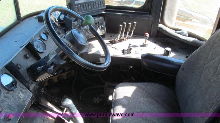 image for item G2138 1990 Ag-Chem TerraGator 1603T self-propelled sprayer