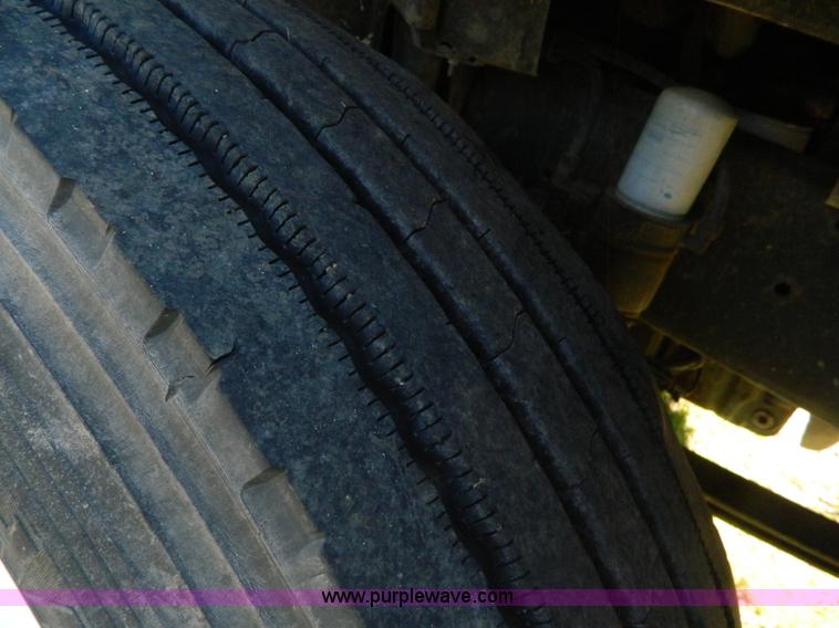 image for item AD9976 2000 Freightliner FL70 truck cab and chassis