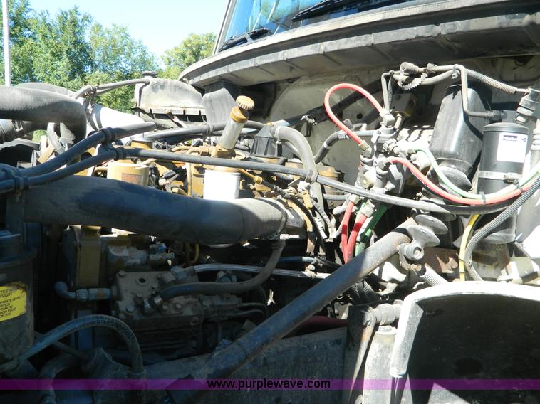 image for item AD9976 2000 Freightliner FL70 truck cab and chassis