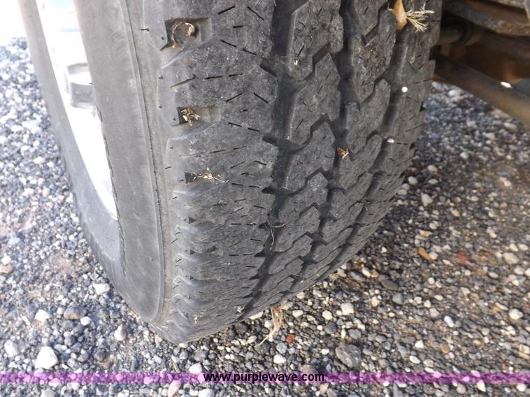 image for item I8390 2003 Ford F250 King Ranch Super Duty Crew Cab pickup truck