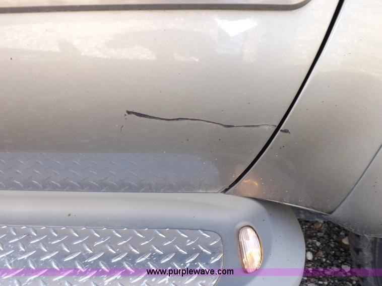 image for item I8390 2003 Ford F250 King Ranch Super Duty Crew Cab pickup truck