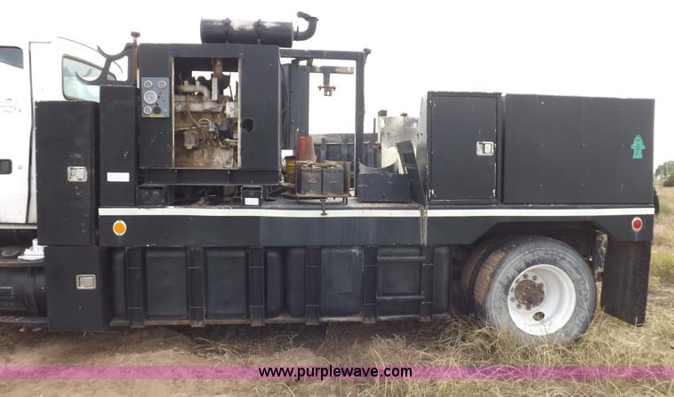 image for item I8432 1992 Ford LN8000 flatbed truck