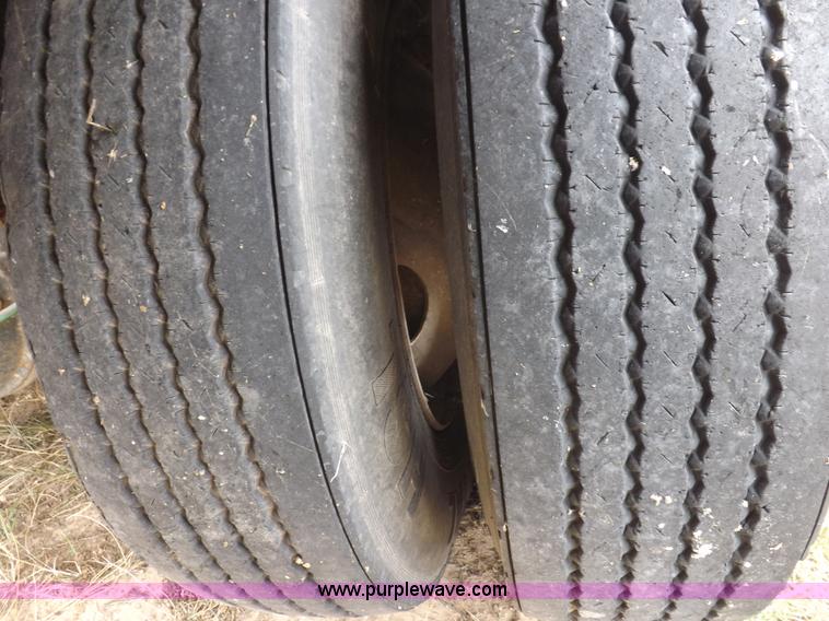 image for item I8432 1992 Ford LN8000 flatbed truck