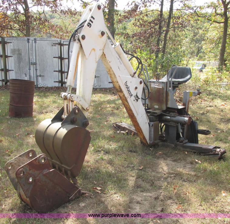 image for item AN9166 Bobcat 911 hydraulic backhoe attachment