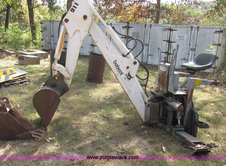 image for item AN9166 Bobcat 911 hydraulic backhoe attachment