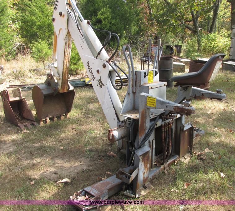 image for item AN9166 Bobcat 911 hydraulic backhoe attachment
