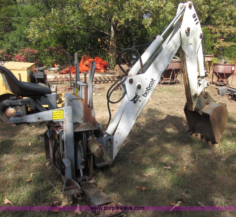 image for item AN9166 Bobcat 911 hydraulic backhoe attachment