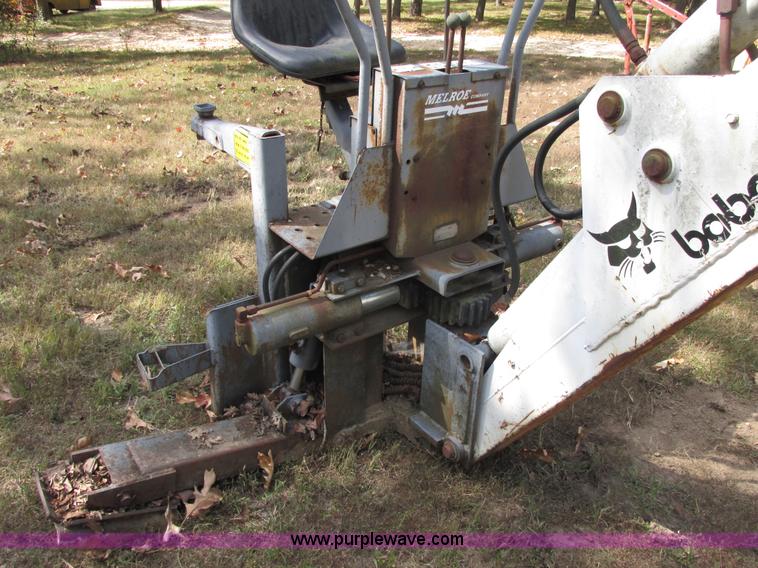image for item AN9166 Bobcat 911 hydraulic backhoe attachment