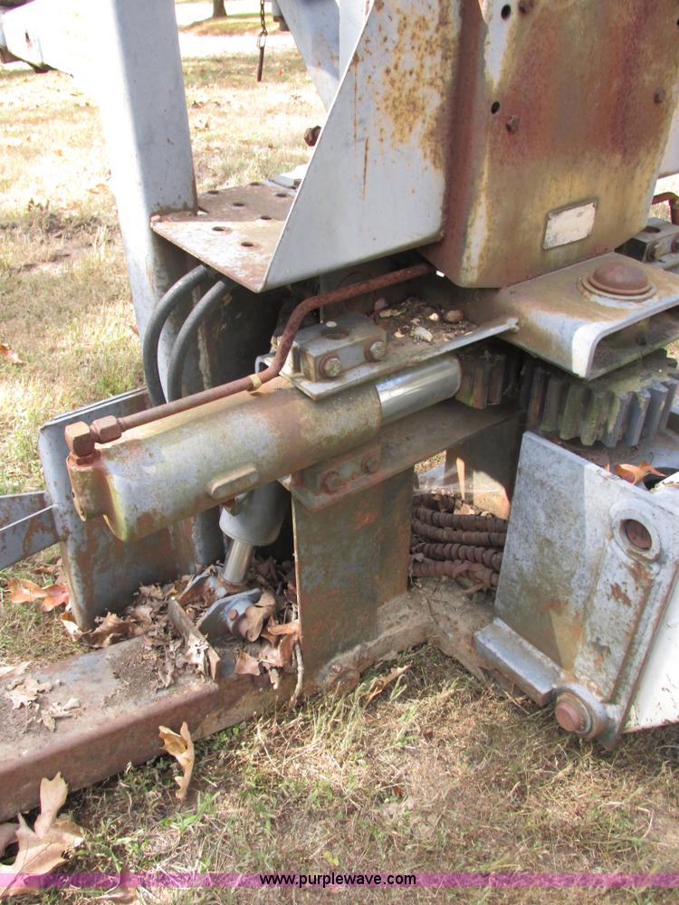 image for item AN9166 Bobcat 911 hydraulic backhoe attachment