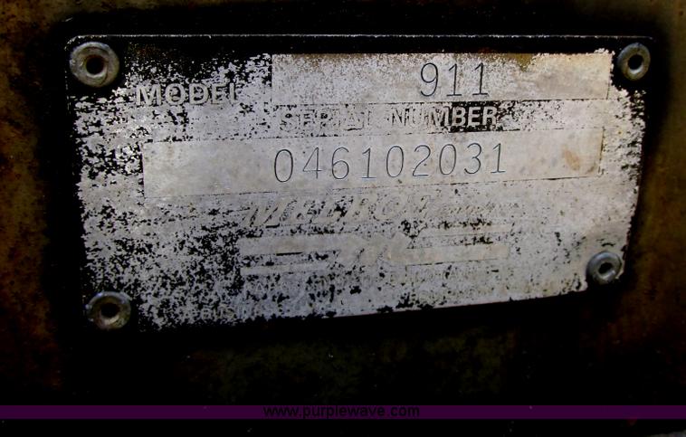 image for item AN9166 Bobcat 911 hydraulic backhoe attachment