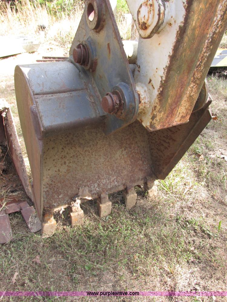 image for item AN9166 Bobcat 911 hydraulic backhoe attachment