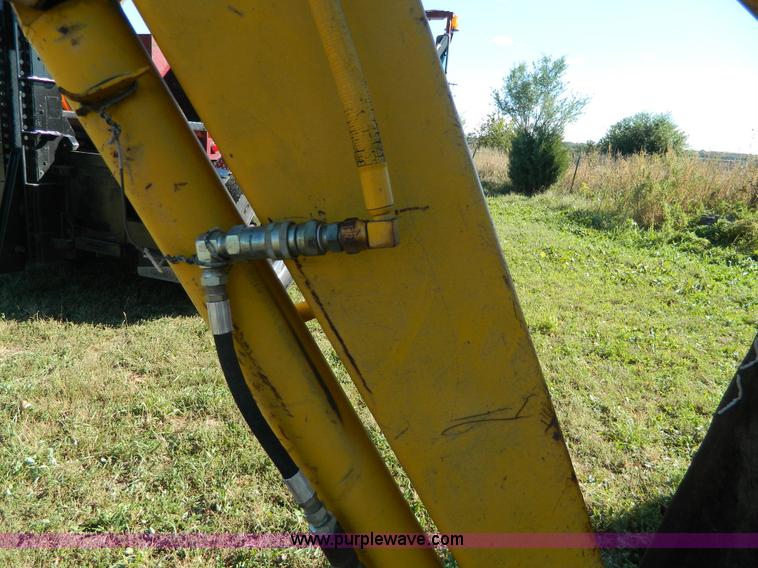 image for item AZ9113 Ford DF211F backhoe