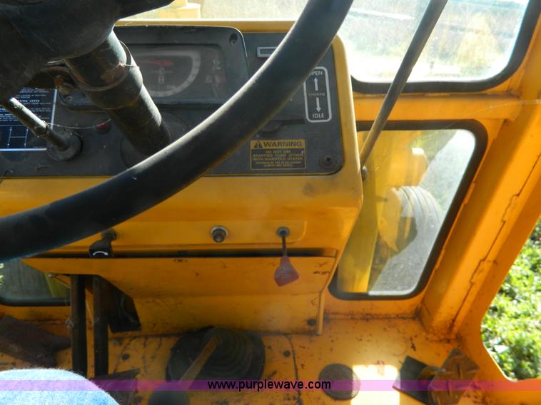 image for item AZ9113 Ford DF211F backhoe