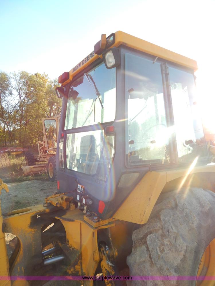 image for item E7300 1988 John Deere 610C backhoe