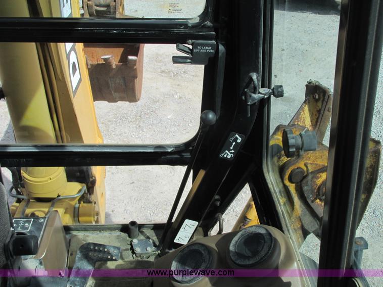 image for item E7399 1998 John Deere 310SE backhoe