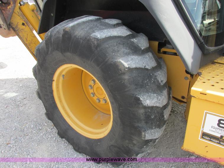 image for item E7399 1998 John Deere 310SE backhoe