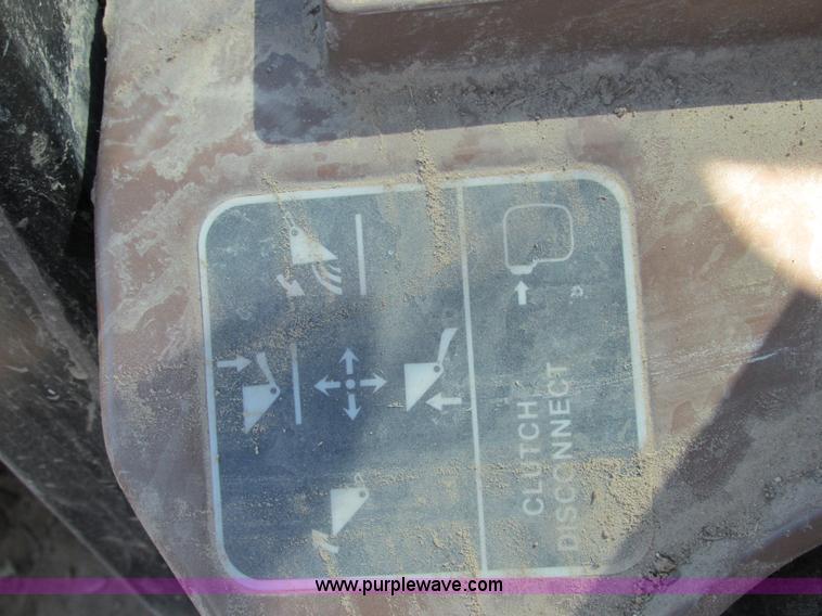 image for item E7409 2000 John Deere 710D backhoe