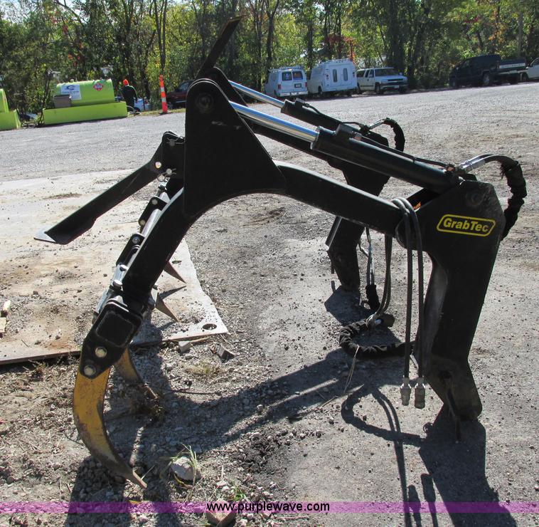 image for item F5354 Grab-Tec GB77 backhoe grapple attachment