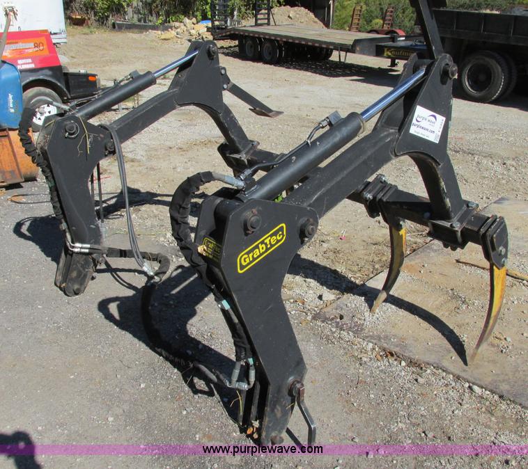 image for item F5354 Grab-Tec GB77 backhoe grapple attachment