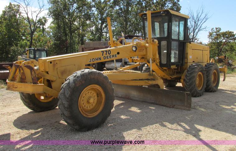 image for item F5356 1980 John Deere 770A articulated motor grader