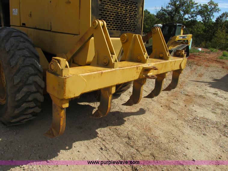 image for item F5356 1980 John Deere 770A articulated motor grader