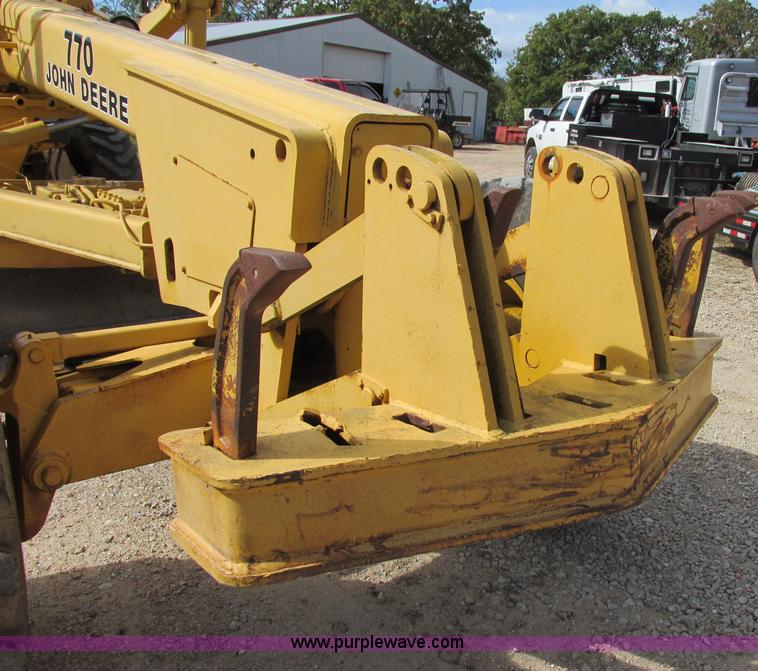 image for item F5356 1980 John Deere 770A articulated motor grader