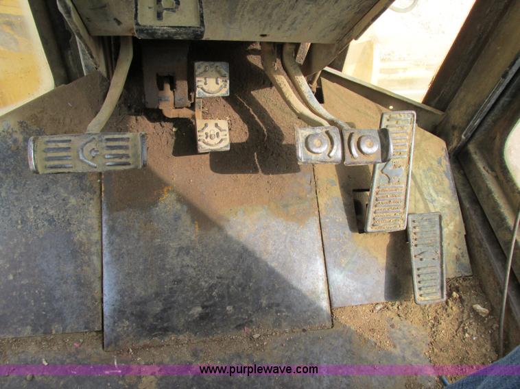 image for item F5356 1980 John Deere 770A articulated motor grader