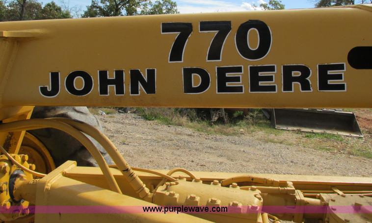 image for item F5356 1980 John Deere 770A articulated motor grader
