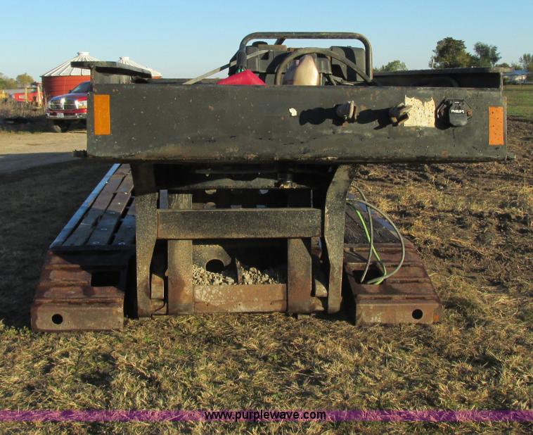 image for item F5359 2002 Fontaine RAM-50-ANGB triple axle lowboy trailer