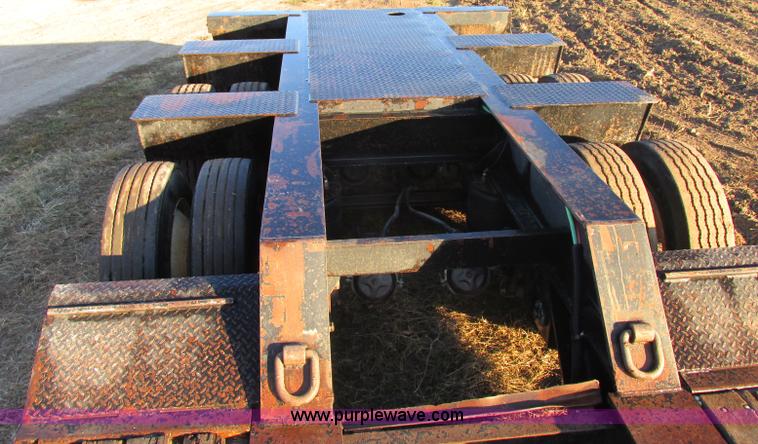 image for item F5359 2002 Fontaine RAM-50-ANGB triple axle lowboy trailer