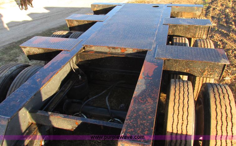 image for item F5359 2002 Fontaine RAM-50-ANGB triple axle lowboy trailer