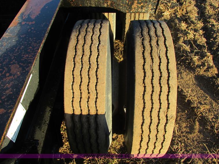 image for item F5359 2002 Fontaine RAM-50-ANGB triple axle lowboy trailer