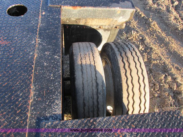 image for item F5359 2002 Fontaine RAM-50-ANGB triple axle lowboy trailer