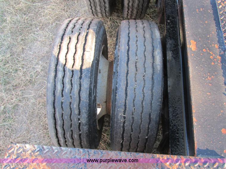 image for item F5359 2002 Fontaine RAM-50-ANGB triple axle lowboy trailer