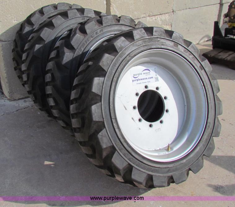 image for item G4274 (4) Outrigger OTR lift guard tires and wheels