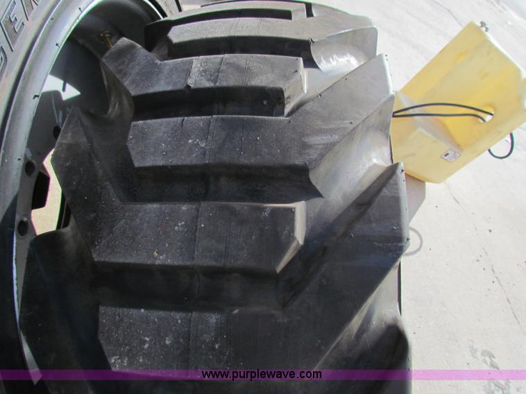 image for item G4274 (4) Outrigger OTR lift guard tires and wheels