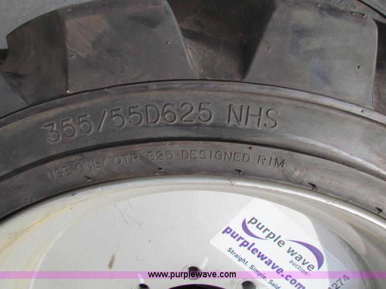 image for item G4274 (4) Outrigger OTR lift guard tires and wheels