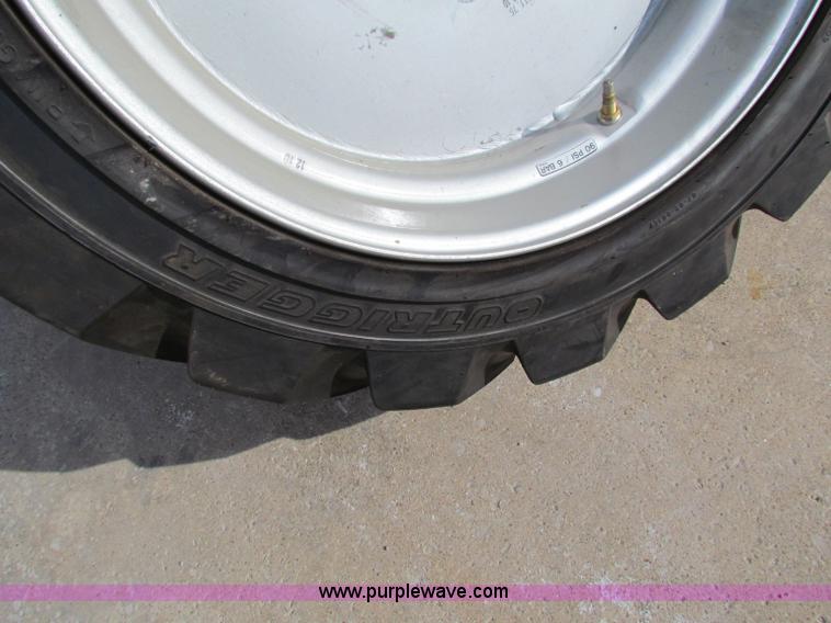 image for item G4274 (4) Outrigger OTR lift guard tires and wheels