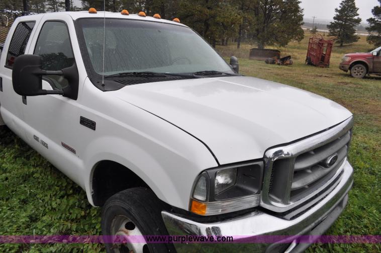 image for item G6185 2004 Ford F550 Crew Cab utility truck