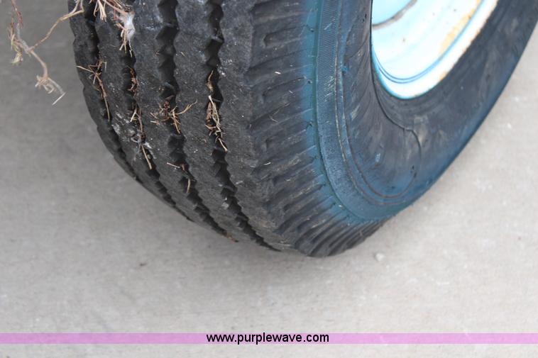 image for item H6871 2000 Genie TMZ-50\30 towable boom lift