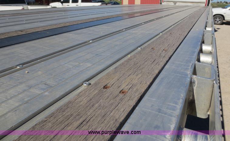 image for item F6687 2011 Transcraft Eagle II flatbed trailer