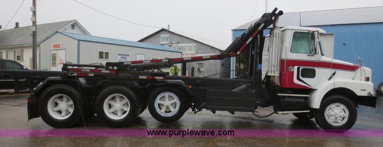 image for item F8010 1996 Volvo WG roll off truck